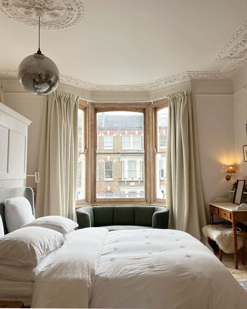 Paleo Linen Vintage Cr4eam Curtains in a bedroom in a bay window